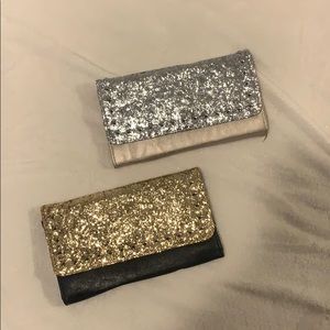Two, sequin clutches.